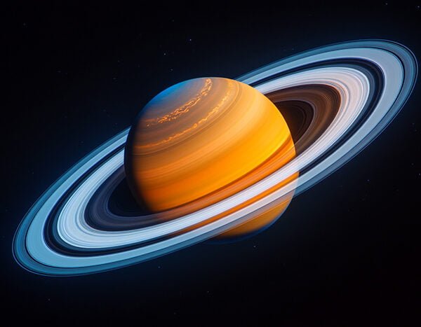 The 9 Planets in Our Solar System 6 Image of the planet Saturn with its prominent rings, shown against a dark space background. The planet has a yellow and brown color with bright rings encircling it.