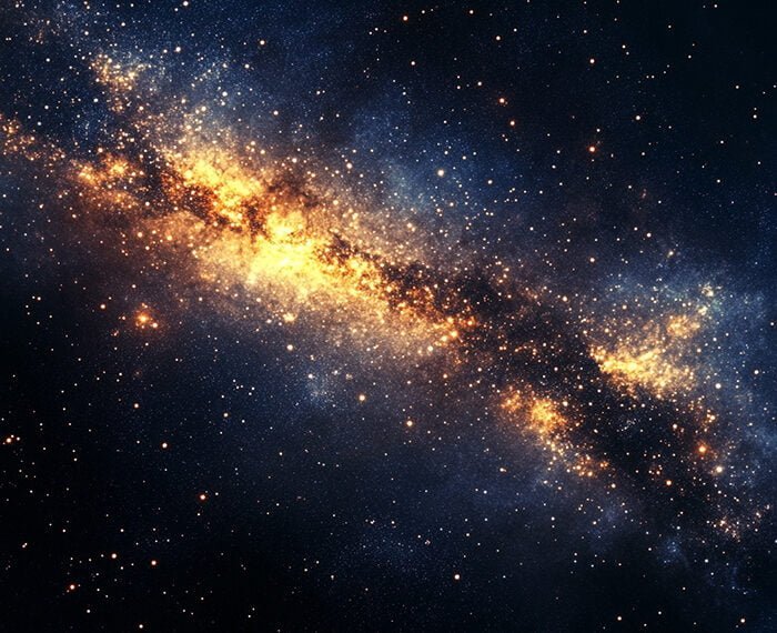 A vast, bright, golden and blue galaxy stretches across the dark expanse with numerous twinkling stars as its backdrop.