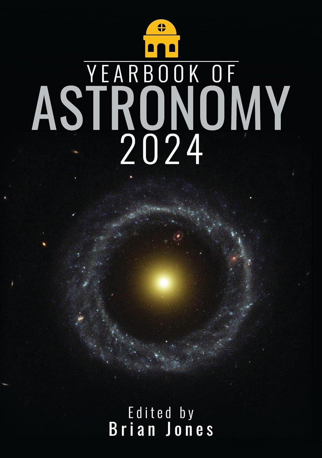 Cover of "Yearbook of Astronomy 2024" edited by Brian Jones, featuring an image of a galaxy with a bright center and blue outer ring on a black background.