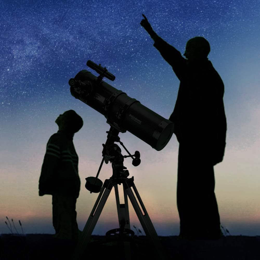 Two silhouetted figures, one adult andA child standing near a Polaris 130EQ Newtonian telescope.. The adult points upwards against the starry night sky backdrop, guiding the child's gaze toward the wonders beyond.