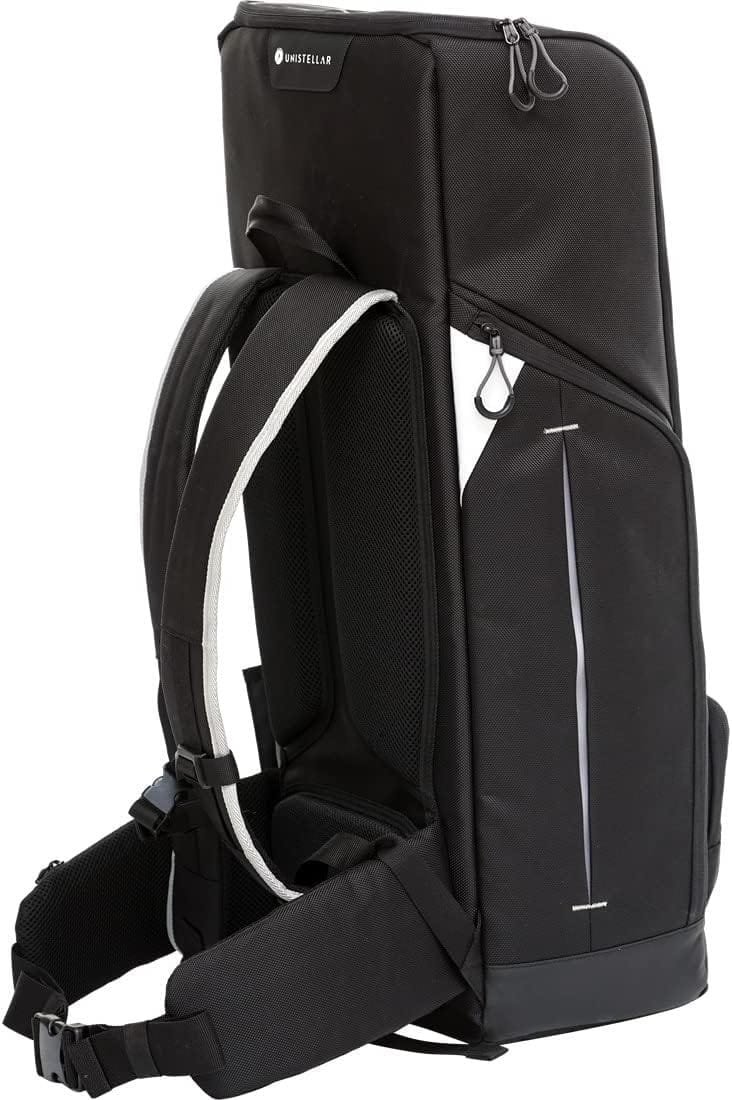 Black photography backpack with multiple compartments, a padded shoulder harness, and side zipper pockets.