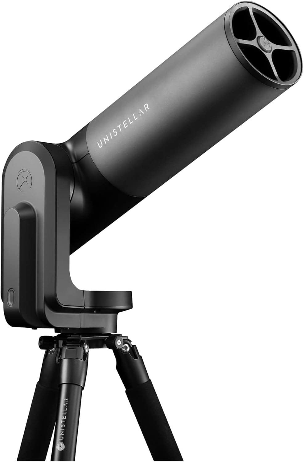 A black Unistellar telescope mounted on a tripod, angled upward.