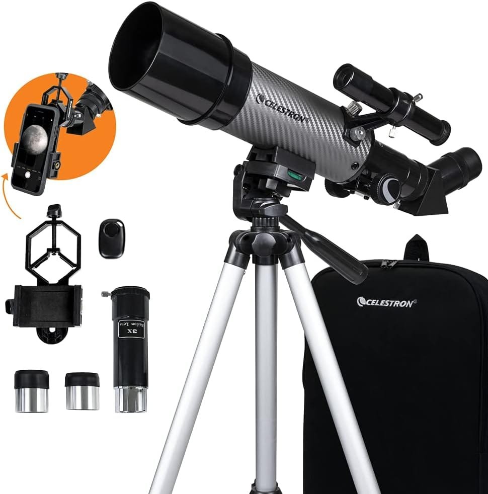 A Celestron telescope kit with tripod, two eyepieces, a smartphone adapter, and a carrying case is displayed.