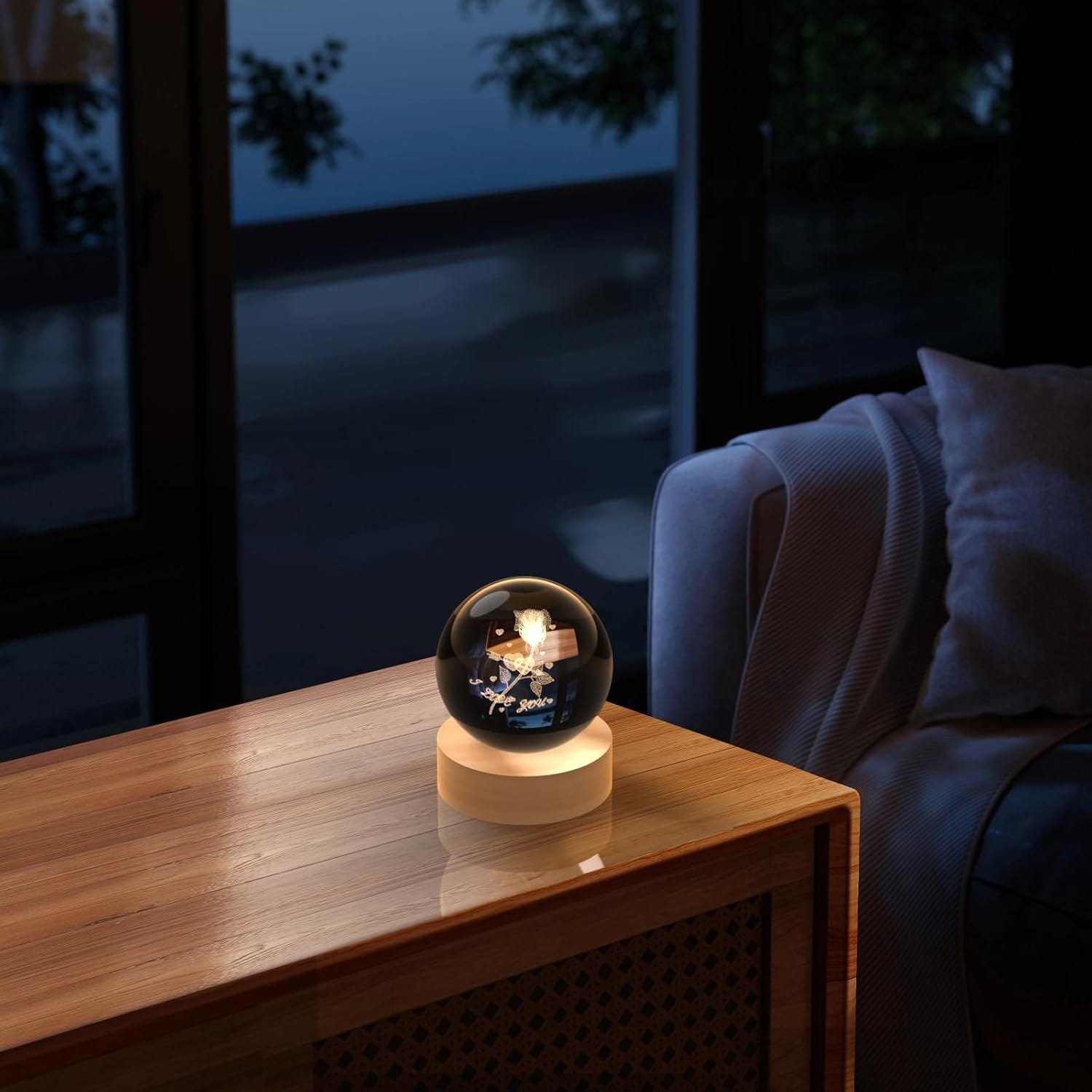 A glowing glass orb with a miniature solar system sits on a wooden table by a couch, with a window showing a dark outdoor view.