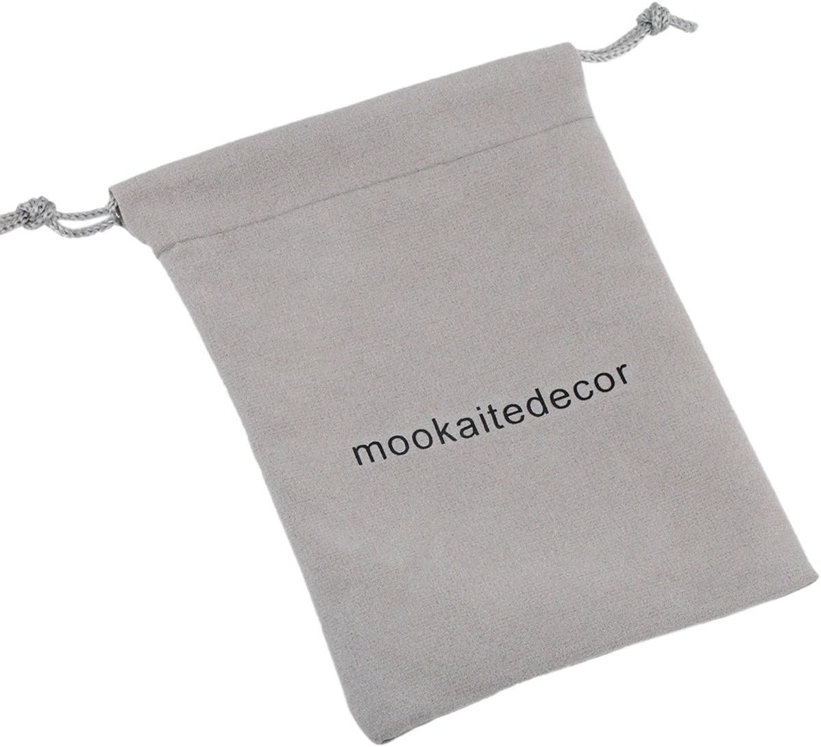 A gray drawstring pouch with the text "mookaitedecor" printed on it.