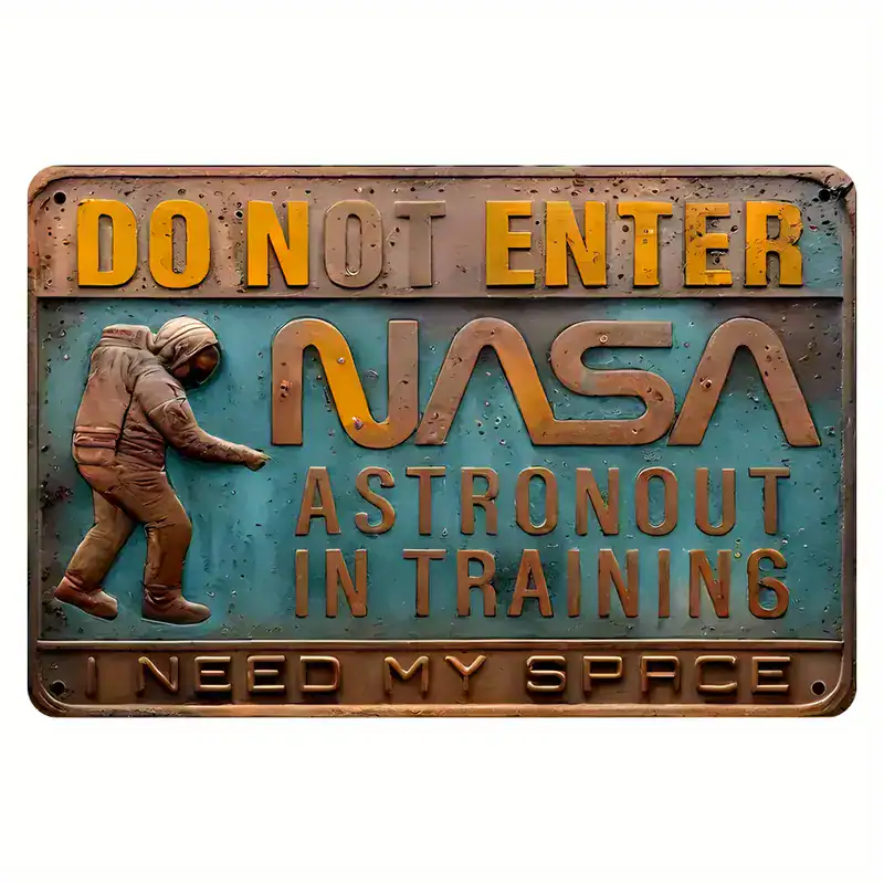 The 3D Embossed Metal Sign with "Do Not Enter NASA Astronaut In Training I Need My Space" is perfect for space theme decor enthusiasts and aspiring astronauts.