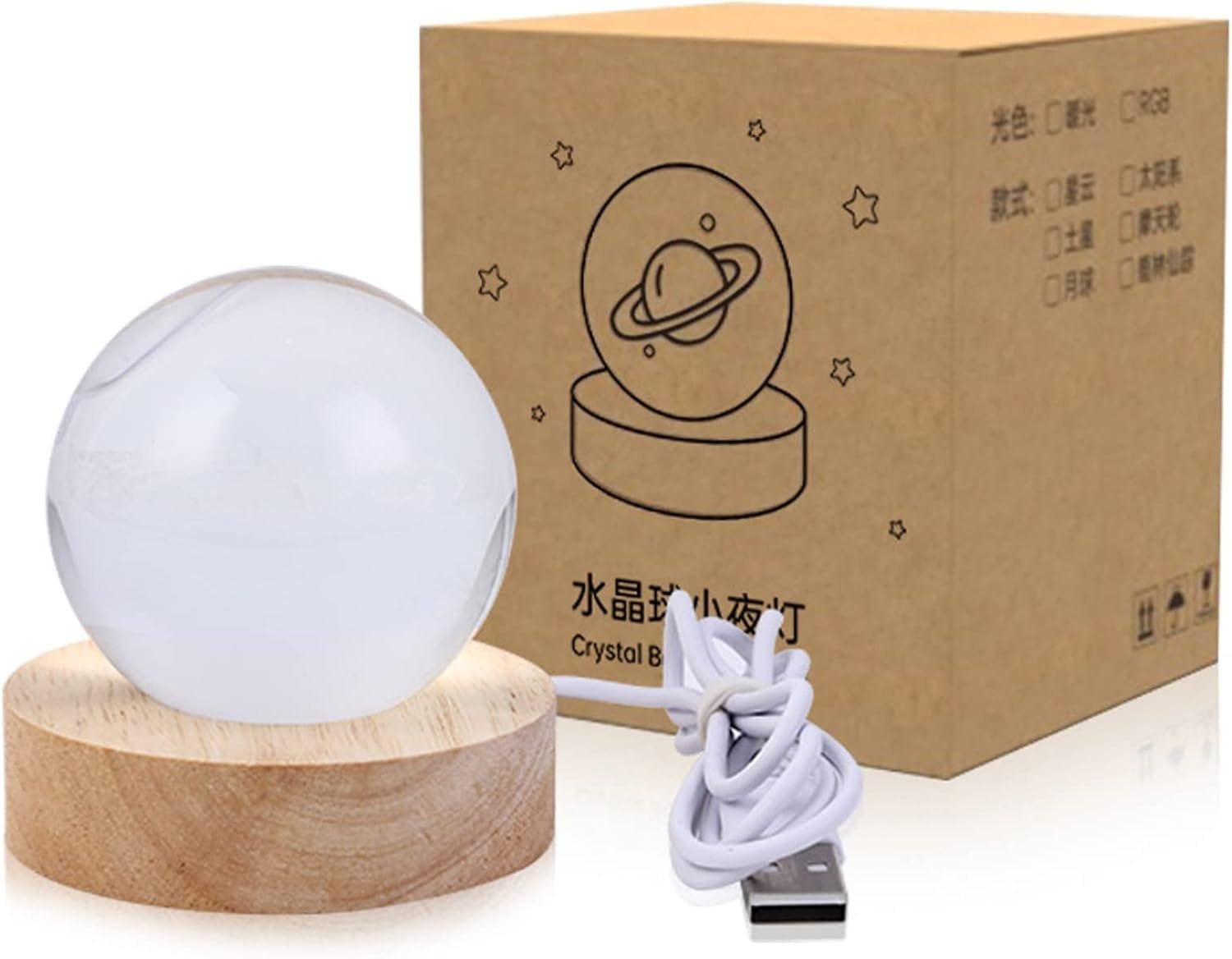 A crystal ball lamp with a wooden base, a USB cable, and a box with a planet design and text in Chinese.