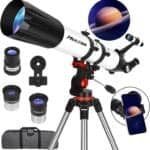 A telescope on a tripod with interchangeable eyepieces, a phone holder, and an image of Saturn. A carrying case is included.
