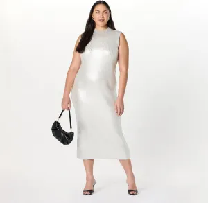 Person wearing a sleeveless, light-colored midi dress and holding a black handbag, standing in front of a plain white background.