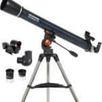Celestron Astromaster 90 telescope with eyepieces, finderscope, and diagonal attachment on a tripod stand.