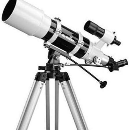 A black and white refractor telescope mounted on a tripod with an adjustment knob and a secondary small scope attached.