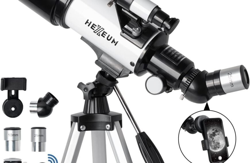 A black and silver telescope on a tripod with various eyepiece accessories and a smartphone adapter, featuring the brand name "Hexeum" on the telescope tube.