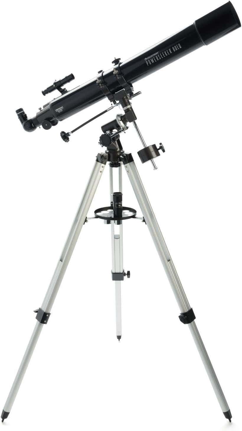 A black refractor telescope mounted on a silver adjustable tripod with various adjustment knobs and a small accessory tray.