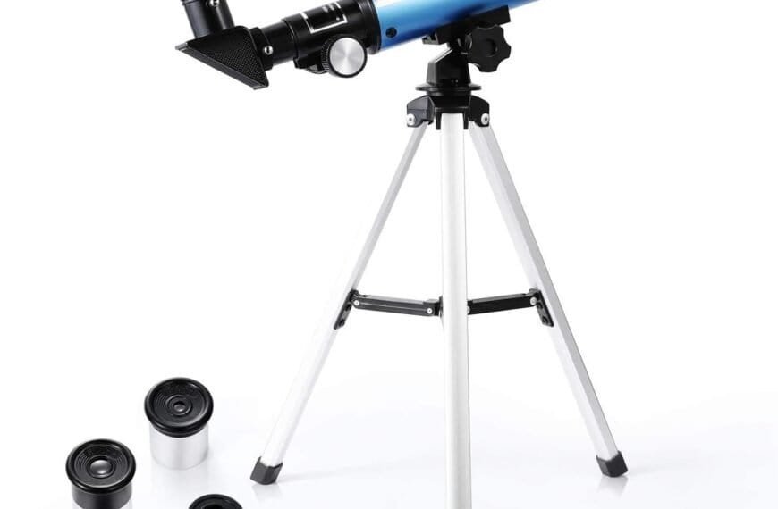 A blue and black telescope mounted on a silver tripod is shown with three interchangeable eyepieces placed beside it on a white background.