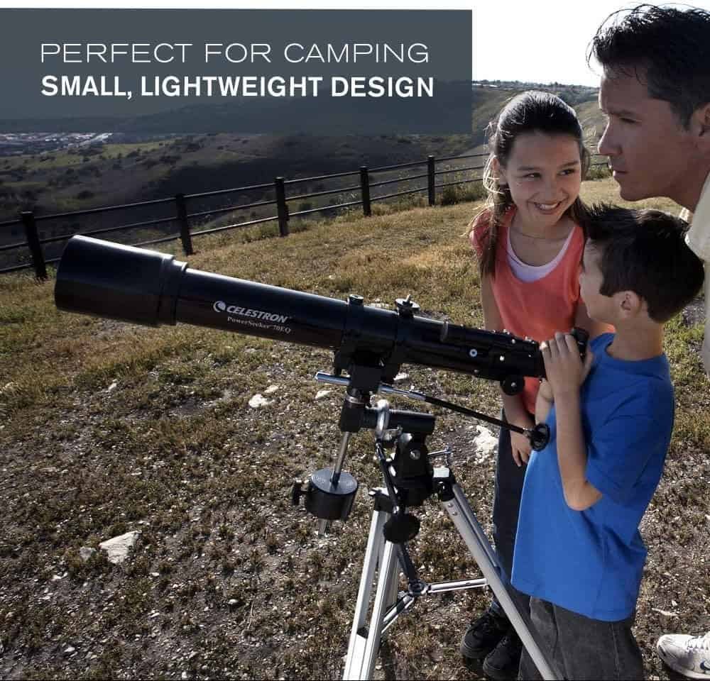 Two children and an adult use a Celestron telescope outdoors on a hilltop. Text overlay reads: "Perfect for camping. Small, lightweight design.