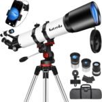 White telescope with blue lens, mounted on a tripod, includes two eyepieces, phone adapter, carrying case, and finder scope.