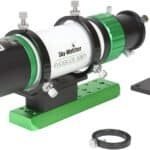 A compact Sky-Watcher EvoGuide 50ED telescope with a green mounting base, adjustment ring, and a separate black mounting bracket shown beside it.