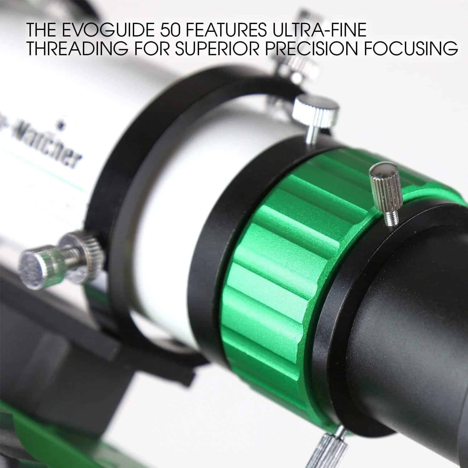 Close-up of the Sky-Watcher Evoguide 50 telescope, highlighting its green ultra-fine focusing knob and demonstrating precise threading for accurate focus adjustment.