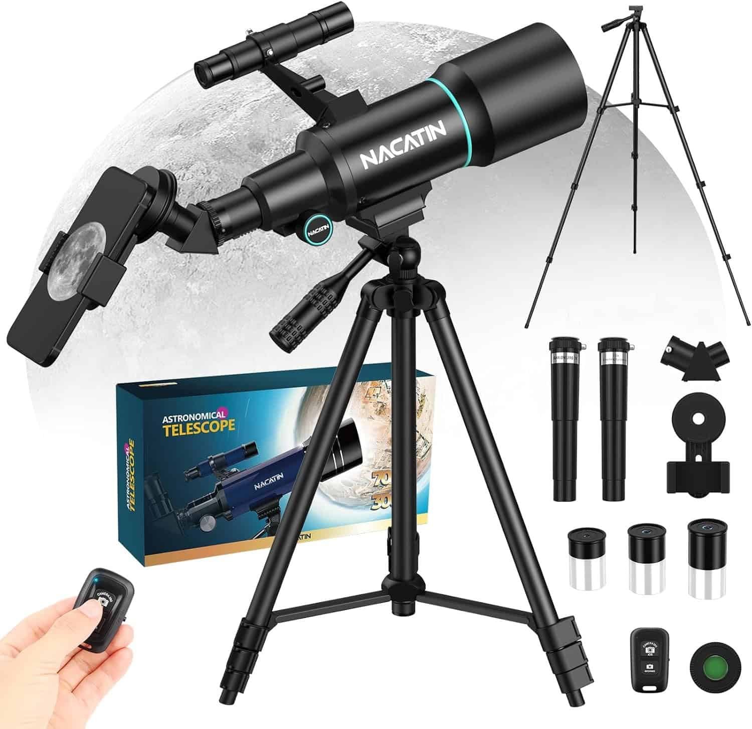 A telescope kit with tripod, smartphone mount, remote control, eyepieces, and accessories, displayed with packaging against a background featuring a large image of the moon.