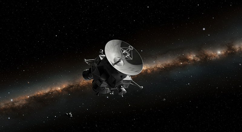 Voyager 1 Space Discoveries | What NASA Found Beyond the Solar System 5 A spacecraft with a large dish antenna is floating in space, with a bright band of stars, likely the Milky Way, visible in the background.