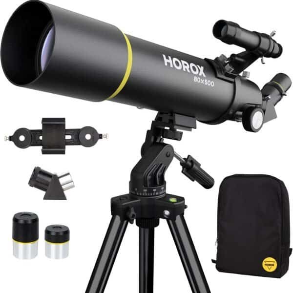 A black HOROX 80x500 telescope on a tripod with two eyepieces, a diagonal mirror, a phone mount, and a carrying bag displayed alongside.