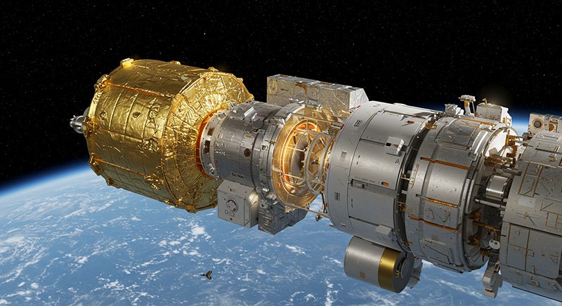 If Space Is Freezing, Then Why Don't Satellites or the International Space Station Freeze? 4 A modular spacecraft segment with gold and metallic coverings, designed for space thermal control, is connected in orbit above Earth, with the planet’s blue surface visible in the background.