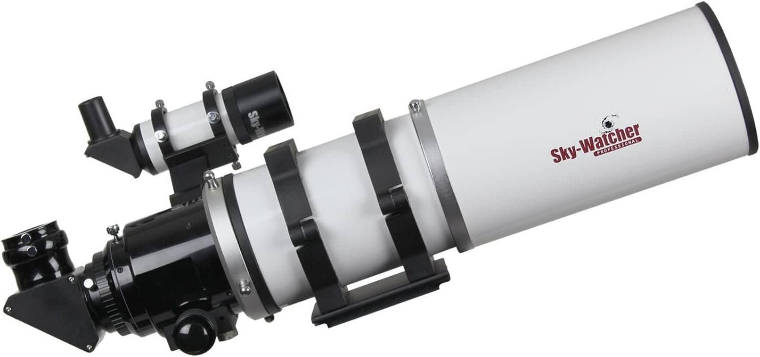 A white Sky-Watcher refractor telescope with black mounting hardware and focusing knobs is shown on a plain background.