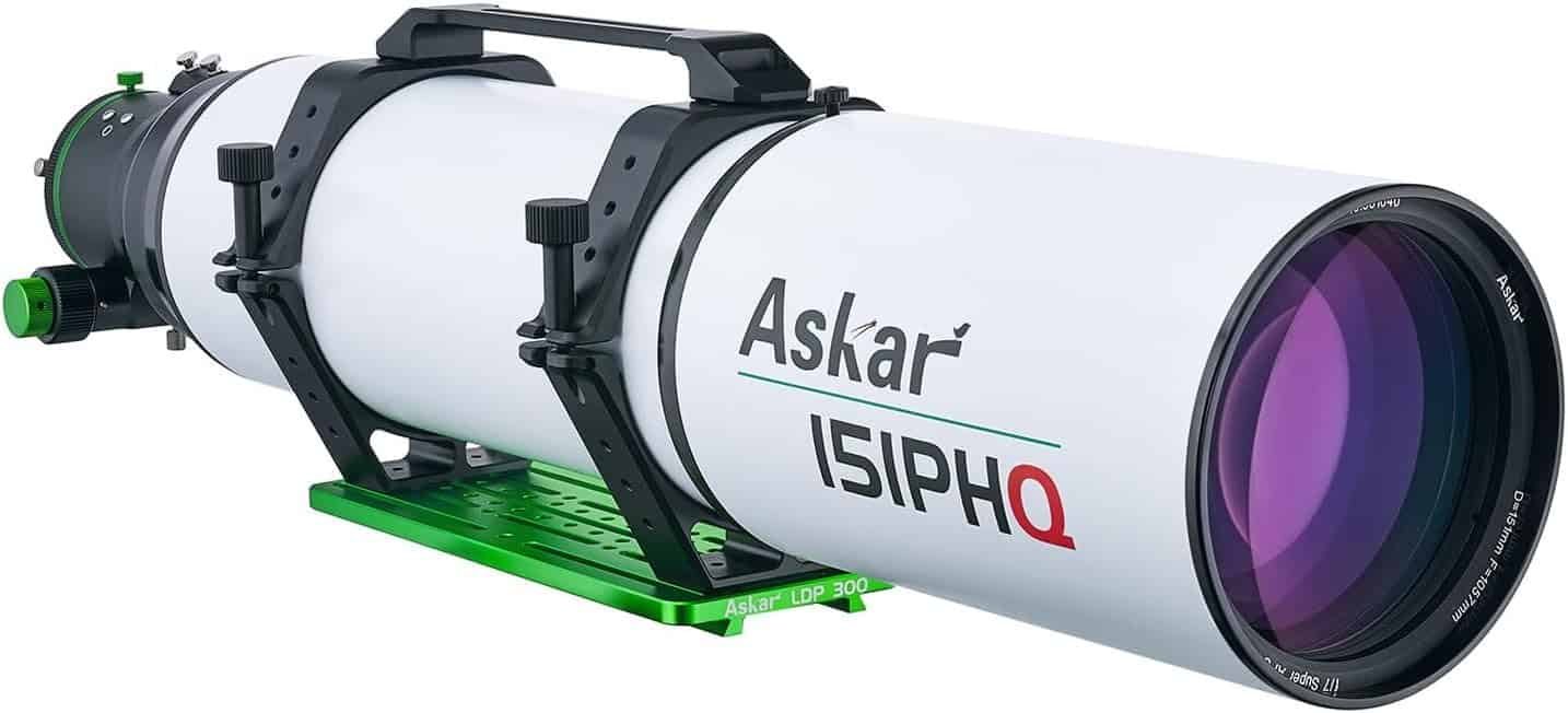A white Askar 151PHQ refracting telescope with black mounts and a green base, featuring a large front lens and adjustment knobs.