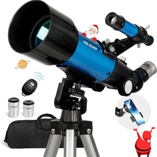 A blue and black telescope on a tripod with two eyepieces, a phone mount, a carrying bag, and cartoon graphics of Santa, Saturn, and a camera remote.