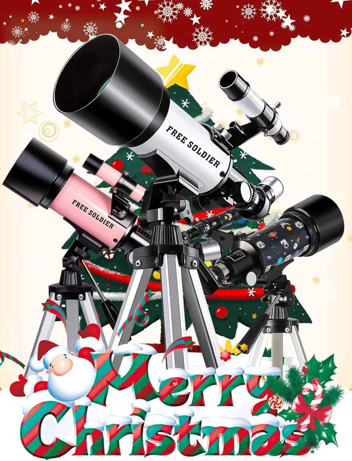 Three telescopes on tripods are arranged in front of a decorated Christmas tree, with "Merry Christmas" text and festive graphics at the bottom.