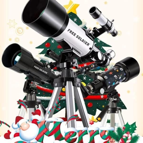 Three telescopes on tripods are positioned in front of a decorated Christmas tree with "Merry Christmas" text and festive graphics at the bottom.