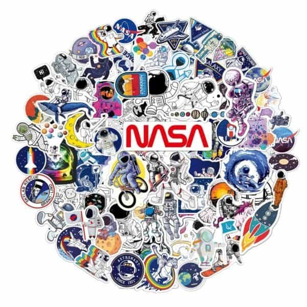 A circular collage of colorful NASA-themed stickers featuring astronauts, rockets, planets, and the NASA logo at the center.
