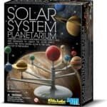 A box of the 4M Kidz Labs Solar System Planetarium kit, showing an assembled model of the solar system planets on a stand.