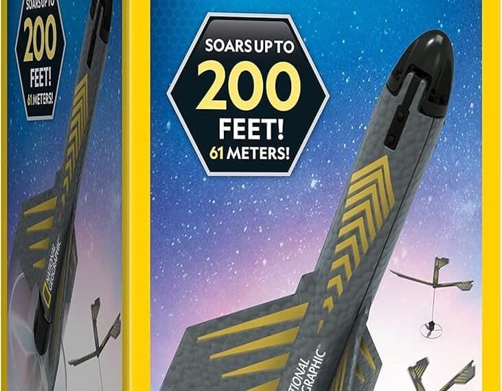 Box of National Geographic Power Rocket STEM toy, featuring a black and yellow motorized rocket that soars up to 200 feet, with 3 flight modes and up to 20 launches per charge.