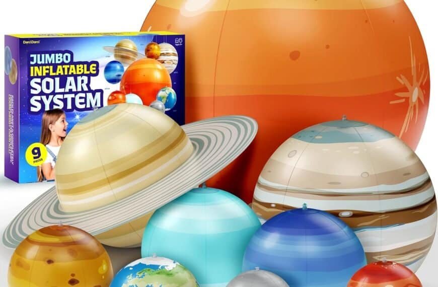 A set of jumbo inflatable solar system planets with a box showing the product and a child looking at the inflatables.