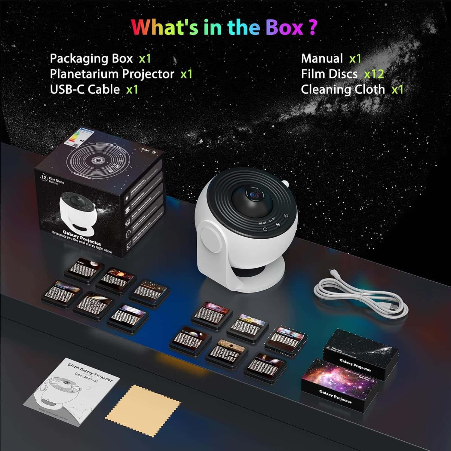 A planetarium projector kit with packaging box, projector, USB-C cable, manual, 12 film discs, and a cleaning cloth displayed on a table.