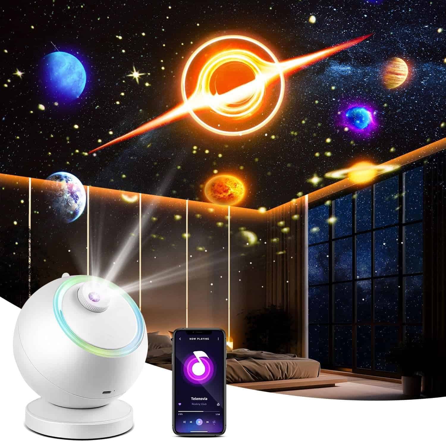 A star projector displays planets and a black hole on a bedroom ceiling; a smartphone app and the projector device are shown in the foreground.