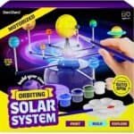 The Dan&Darci 360° Orbiting Solar System for Kids Paint & Build Model Kit includes paints, brushes, planets, and tools—letting kids ages 4-12 paint, build, and explore a motorized, glow-in-the-dark solar system model.