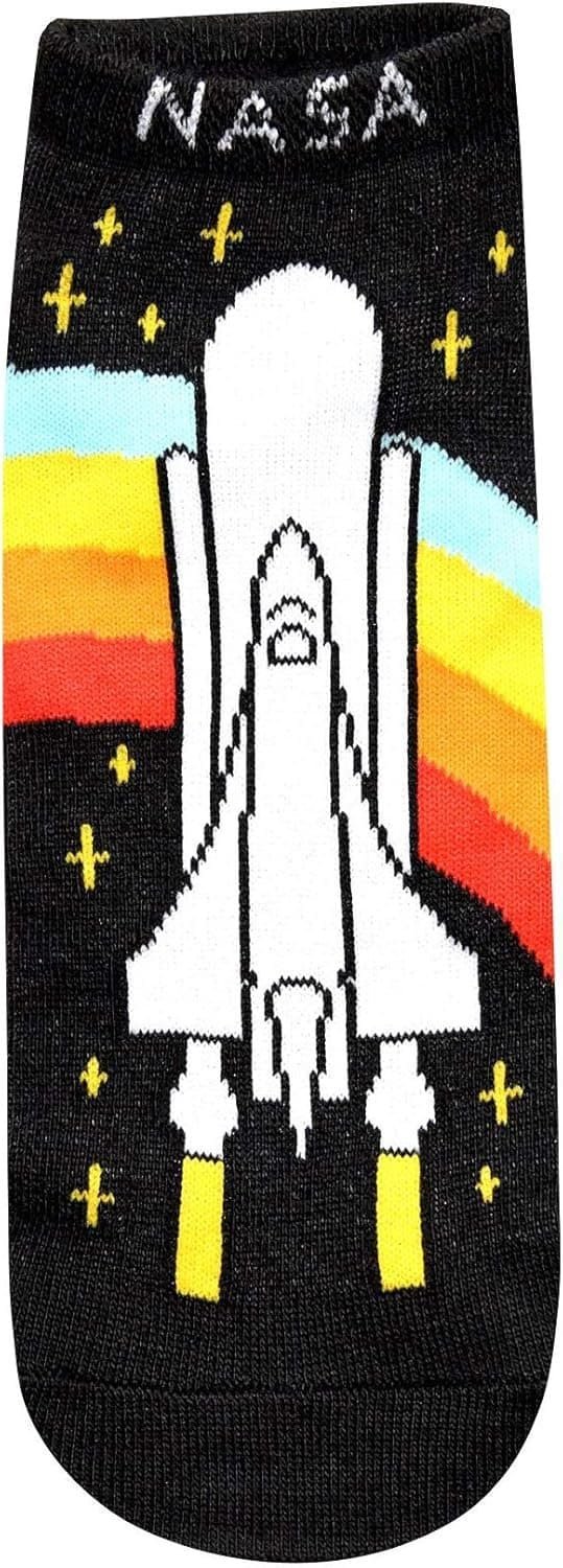 A black sock featuring a white space shuttle, yellow thrusters, rainbow trails, small yellow stars, and the word “NASA” at the top.