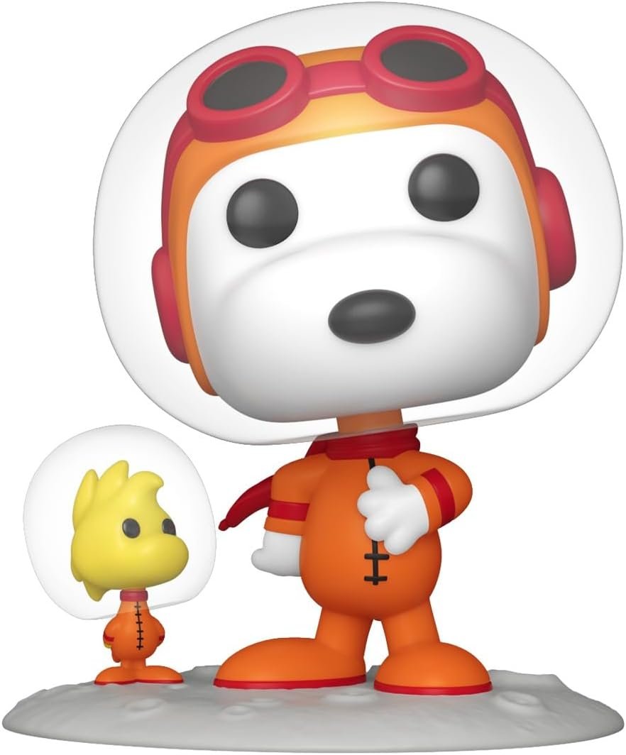 A Funko Pop! vinyl figure of Snoopy in an orange astronaut suit and helmet, standing beside Woodstock, also in a matching suit and helmet, on a grey base.