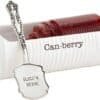 A can-shaped white dish labeled "Can-berry" holds sliced cranberry sauce; a silver serving spatula labeled "SLICE'N SERVE" rests in front.