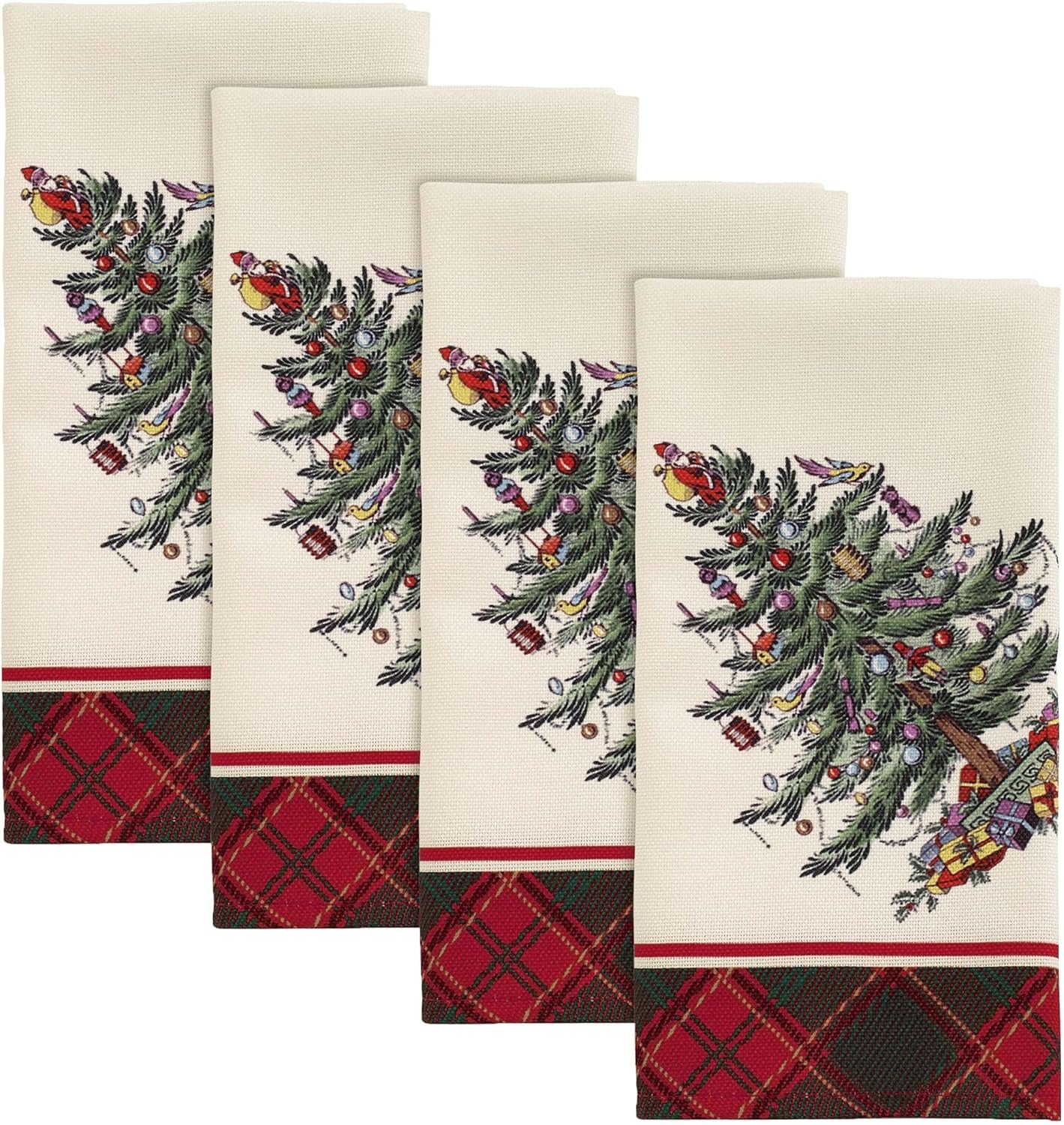 Four white kitchen towels featuring a decorated Christmas tree and presents design, with a red plaid border at the bottom.