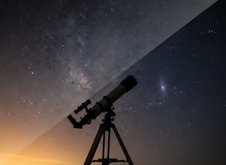 A telescope stands on a tripod, silhouetted against a sky that dramatically contrasts light pollution on the left with a clear, star-studded sky on the right.