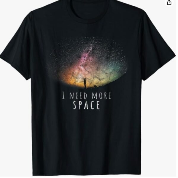 The I Need More Space Funny Galaxy Astronomy Science Pun T-Shirt features a silhouette gazing at a colorful starry sky with the text "I NEED MORE SPACE"—a perfect, unique gift for astronomy fans and science enthusiasts.