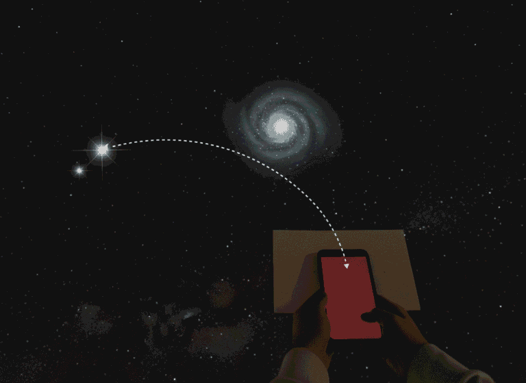 Hands hold a smartphone pointed at the night sky, with a dotted line connecting stars and a distant galaxy above to the device, suggesting data or signal transfer across the sky.