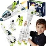 A smiling boy holds a toy rocket. The image also shows toy astronauts, a space shuttle, and the toy set’s packaging labeled "Space Adventure Team.