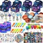 A collection of outer space themed party favors including gift boxes, necklaces, bracelets, bouncy balls, slime, stickers, slap bracelets, stampers, and whistles.
