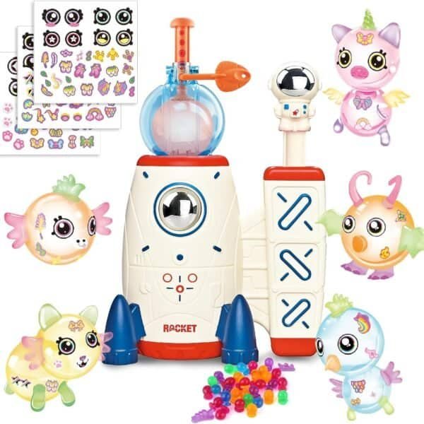Children’s toy set with a white rocket ship, colorful winged animal figures, stickers, and small multicolored beads displayed on a white background.