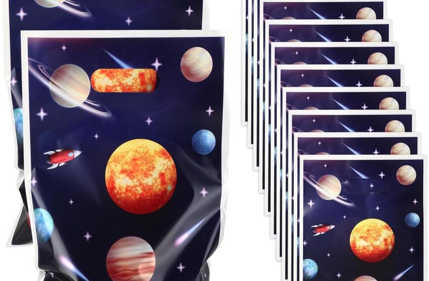 A set of party favor bags with a space-themed design, featuring planets, stars, and rockets on a dark background.