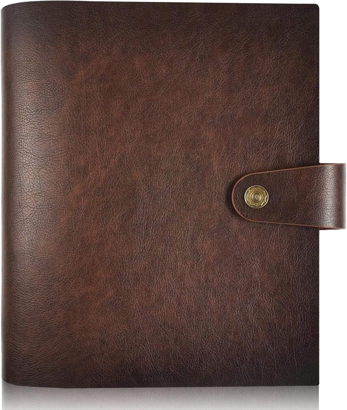 A closed brown leather journal with a textured cover and a strap secured by a gold button clasp.